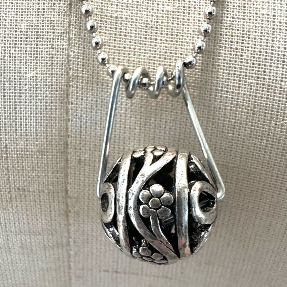 Silver tone ball pendant necklace